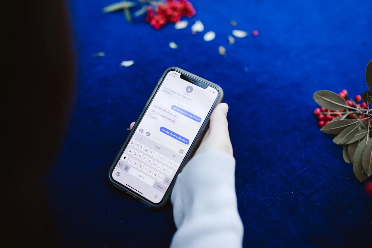 Close-up of a smartphone displaying text messages - the workflow most dry cleaners are already doing by hand.